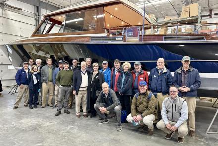 CCA members and guests with Daychaser 48 in the background